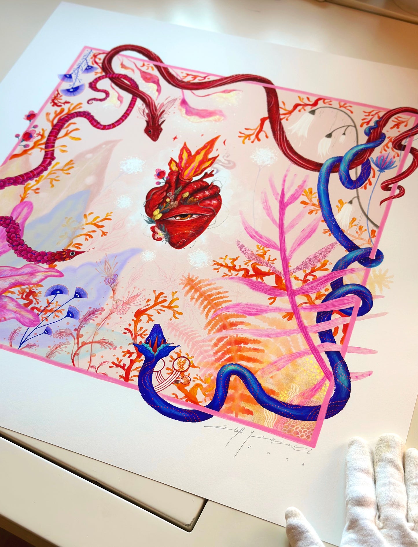 "Heart Aflame" art print showing a mystical red winged serpent and delicate pastel botanical illustrations on high-quality paper.