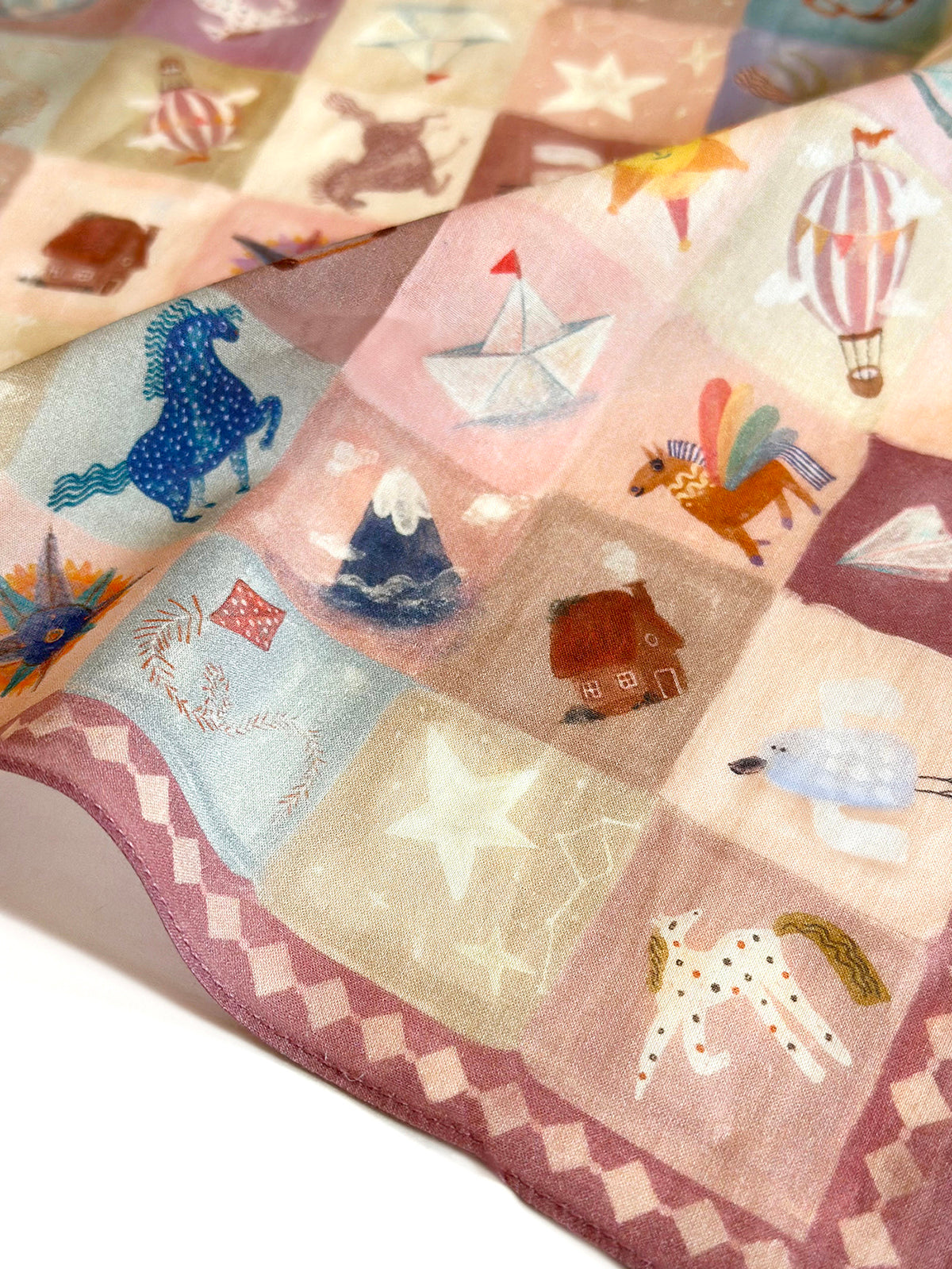 High-quality detail of 'Call When You Land' cotton print, showcasing the dreamy pastel motifs and artisanal feel of the 'Pocket of Joy' series.