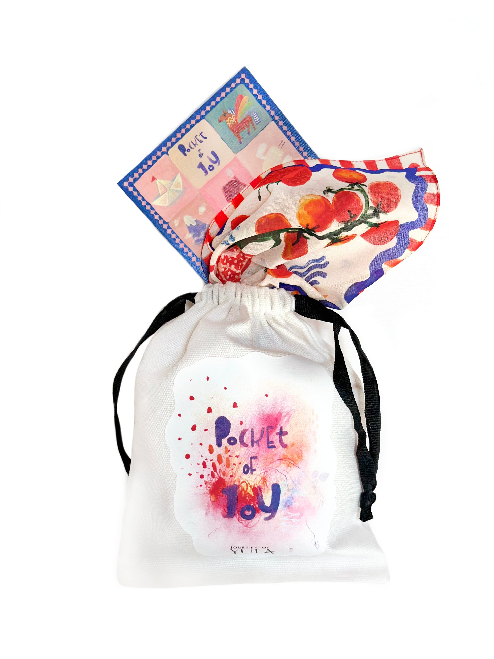 Journey of Yula cotton scarf featuring a vibrantly illustrated scarf and a signature 'Pocket of Joy' cotton gift bag on a clean white background.